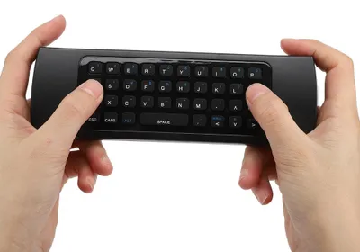 Zdjęcie produktu dla Bezprzewodowy pilot w kształcie myszki 2,4 GHz z regulacją ustawień podczerwieni – wielofunkcyjna mini-klawiatura do systemów Windows, Android i Linux