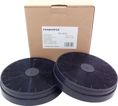 A cardboard box with a label and two charcoal filters for a range hood.