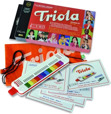 A gift set for a Triola musical instrument, including the instrument, a bag, and instructional booklets.