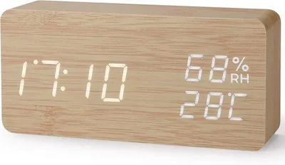Imagen del producto de Despertador digital con diseño de madera, pantalla de 12/24 horas, control por voz, sensor de fecha, temperatura y humedad, función de carga USB, diseño rectangular, color madera
