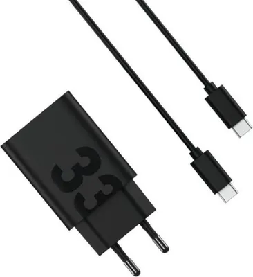 A black Motorola TurboPower 33W charger and USB-C cable are shown against a white background.