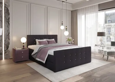 A bedroom scene featuring a large bed with bedding, a nightstand, and a lamp.