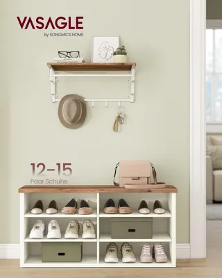 A shoe rack with a shelf and hooks above it, and shoes and storage boxes on the shoe rack. A handbag is on top of the shoe rack.