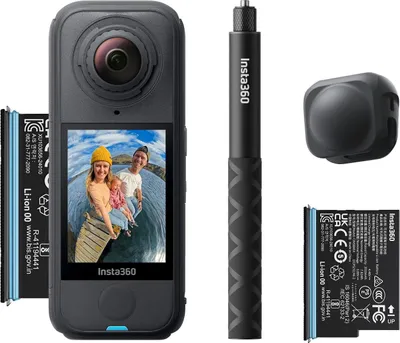 A 360 camera and its accessories are laid out on a white background.