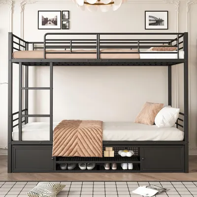 A black metal bunk bed with storage underneath, set up in a room with a white wall and a patterned rug.