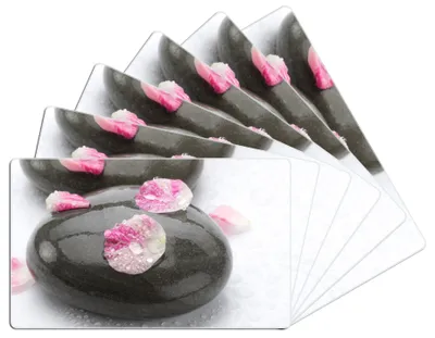 Produktbild von Wallario Frühstücksbrettchen 6er Set aus Glas, je 14 x 23 cm, mit rutschfesten Füßen, Motiv Dunkle Steine mit Blütenblättern