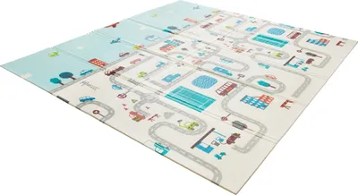 A folded play mat with a city street design.