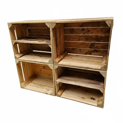 A set of four wooden crates arranged in a 2x2 grid, forming a shelving unit.
