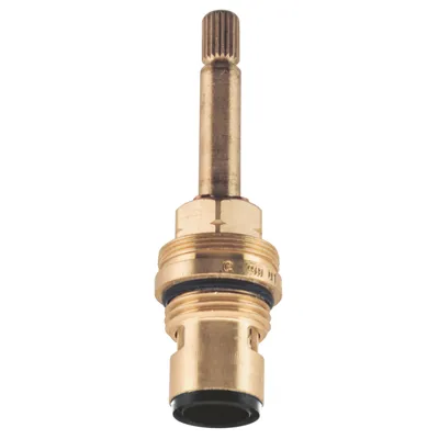 A close-up studio shot of a brass faucet cartridge on a white background.