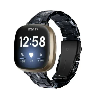 Produktbild von Strap-it Fitbit Sense Resinarmband (Schwarz/Weiß)