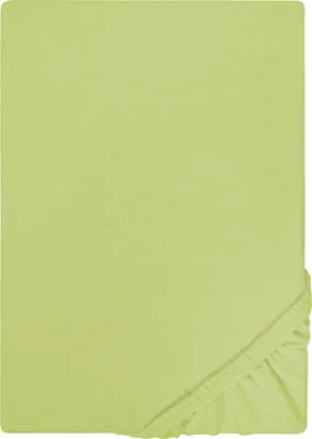 A flat lay of a light green fitted sheet, with the elasticized corner visible in the bottom right.