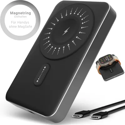 A black wireless power bank with silver trim, shown from a diagonal angle, with a smaller inset image of a smartwatch charging on it, and two USB-C cables in the foreground.