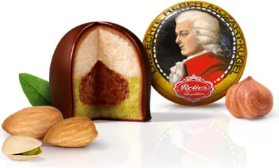 Produktbild von Reber, Mozart-Kugeln Barock, 6er Packung, Mozart-Kugeln aus Zartbitter-Schokolade, Gefüllt mit Pistazien-Marzipan, Mandeln und Haselnuss-Nougat, 120g