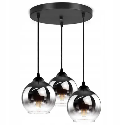 A three-light pendant lamp with spherical glass shades.