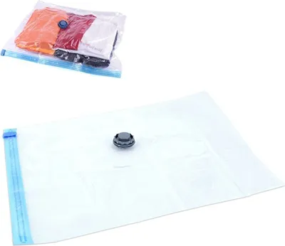 Two vacuum storage bags, one with clothes inside, on a white background.