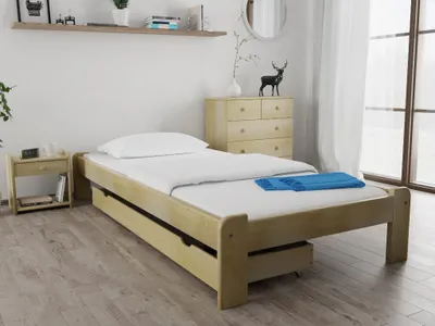 A bedroom scene with a wooden bed frame and a white mattress.
