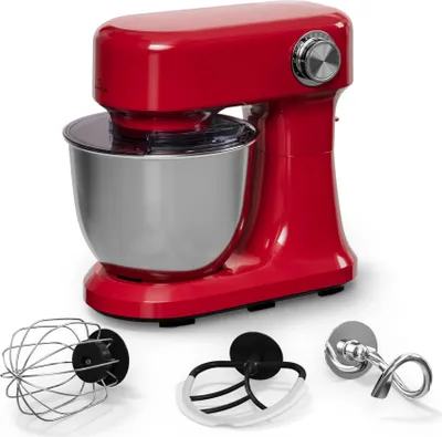 A red stand mixer with its accessories displayed in front of it, on a white background.