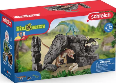 A box of Schleich dinosaur toys with a jungle-like backdrop.