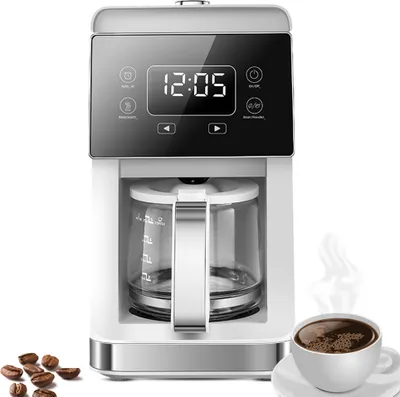 A white coffee maker with a glass carafe and a digital display, shown with coffee beans and a cup of coffee.