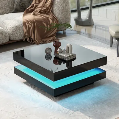 A modern living room setting with a couch and a coffee table.