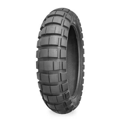 A single motorcycle tire shown against a white background.