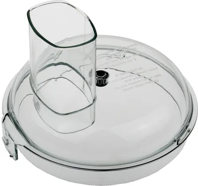 A clear plastic lid for a food processor.
