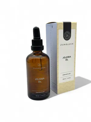 Produktbild von JUNGLÜCK Jojobaöl BIO 100 ml – Vegan & 100% rein | Kaltgepresstes Jojoba-Öl für Gesicht, Haut & Haare | Nährendes, natürliches Körper- & Gesichtsöl