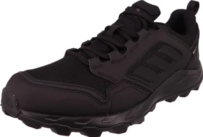 A black Adidas Terrex trail running shoe is shown from a side-angle on a white background.