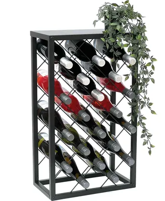 A black metal wine rack filled with wine bottles and a decorative plant on top.