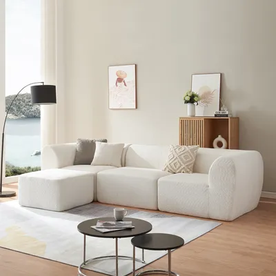 Produktbild von Sofa modułowa 3-osobowa "Hurvas" 2 x element narożny z podłokietnikiem 1 x część środkowa 1 x podnóżek 76 x 313 x 181 cm Bouclé kremowy biały