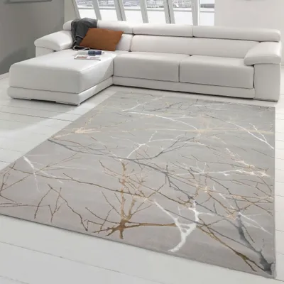 Produktbild von Designer Teppich mit abstraktem glänzenden Ästemuster gold Größe - 160 x 230 cm