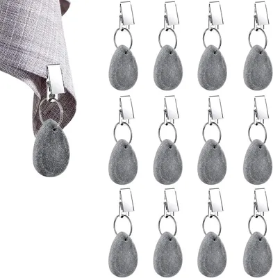 Imagen del producto de Pesas para manteles hechas de piedra natural, juego de 12 unidades, con abrazaderas metálicas, para uso en exteriores
