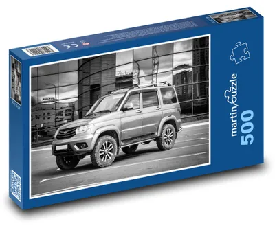 Zdjęcie produktu dla Puzzle 500 Nowoczesny samochód terenowy w mieście - martinpuzzle