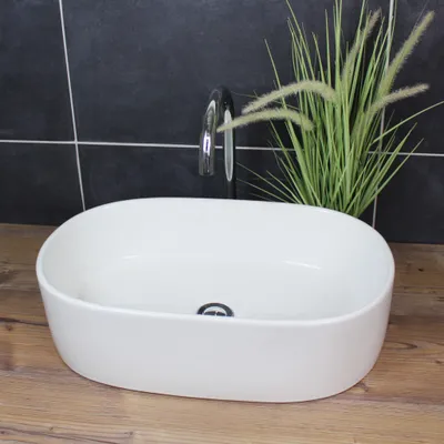 Produktbild von Design Aufsatzwaschbecken 56 x 34,5 x 14 cm Waschbecken modern Keramik Weiß Waschschale