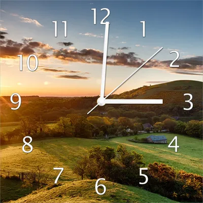 Produktbild von Wallario Design Wanduhr Schlosspanorama in England bei Sonnenaufgang aus Echtglas, Größe 30 x 30 cm