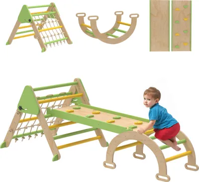 A child playing on a multi-functional indoor playground set.