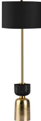 A black and gold table lamp.