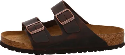 A side view of a brown Birkenstock sandal.