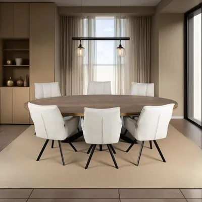 A dining room scene with an oval wooden table and white chairs, illuminated by pendant lights.