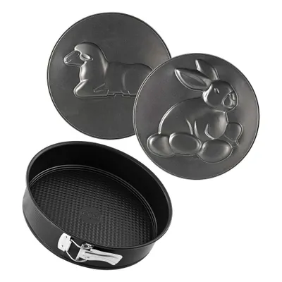 A baking pan and two decorative inserts are shown against a white background.