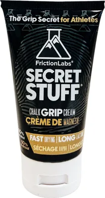 Friction Labs Secret Stuff Hygienic Liquid Chalk in einer schwarzen Tube; ideal für Kletterer.