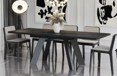 A dining table with chairs in a modern dining room setting.