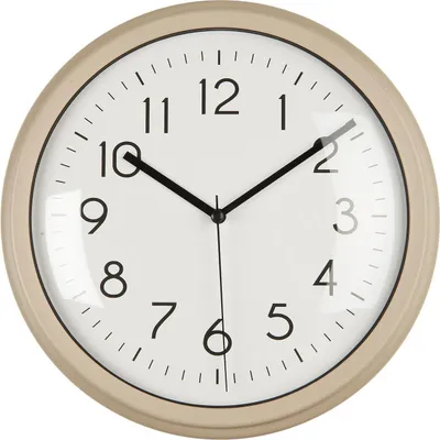 A close-up, front-facing view of a round analog wall clock.