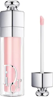 A Dior Addict Max lipstick is shown with its applicator. The lipstick is a pale pink color and the packaging is silver.