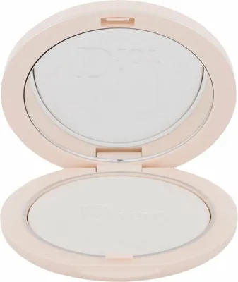 An open compact powder case with the Dior logo embossed on the powder.