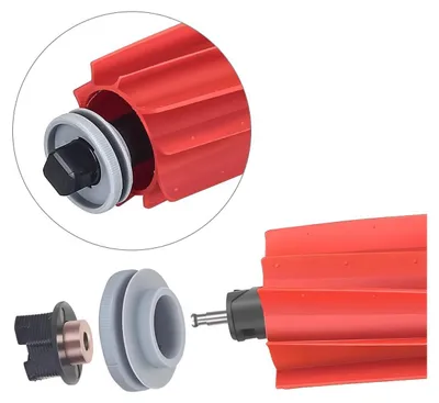 A close-up view of disassembled vacuum cleaner brush parts, with a magnified inset showing a connected component.