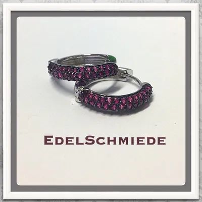 Produktbild von Silbercreolen mit roten Zirkonia, 925/-