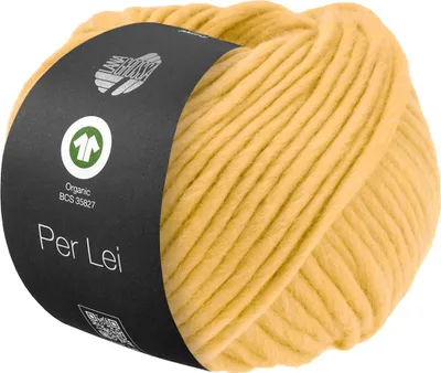 A ball of yellow yarn with a black label wrapped around it.