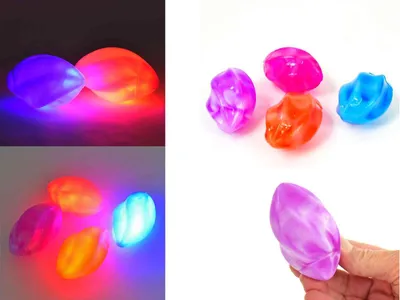 Produktbild von Kögler 4x wilder Leuchtball Sternfrucht Flummi Spielball LED blinkend 8 x 5 cm