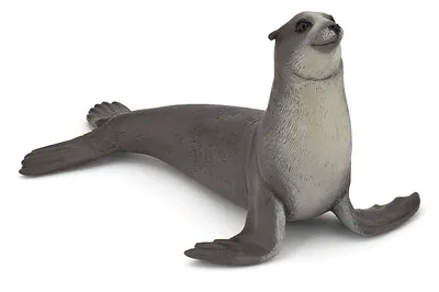 A toy seal figurine on a white background.